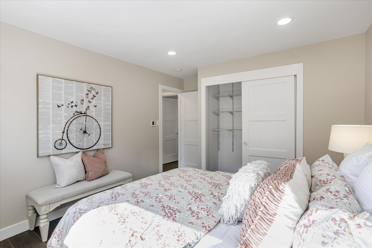1716 Grizilo Drive San Jose, CA 95124 - Photo 21 of 49 a bedroom with a bed and closet