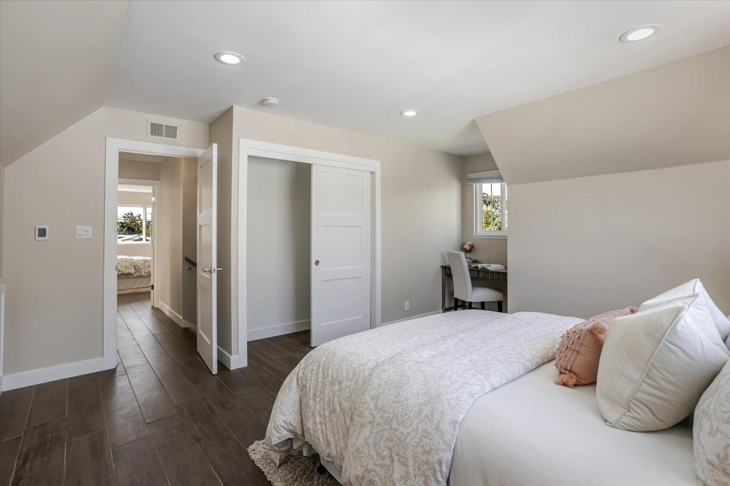 1716 Grizilo Drive San Jose, CA 95124 - Photo 24 of 49 a bedroom with a bed and wooden floor