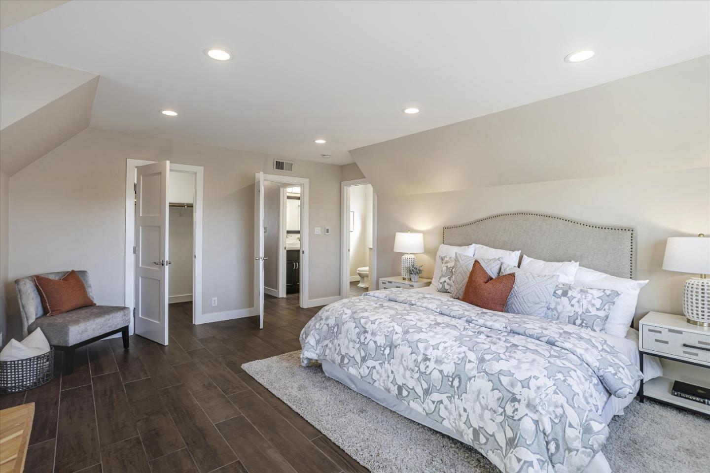 1716 Grizilo Drive San Jose, CA 95124 - Photo 27 of 49 a bedroom with a bed and a chair