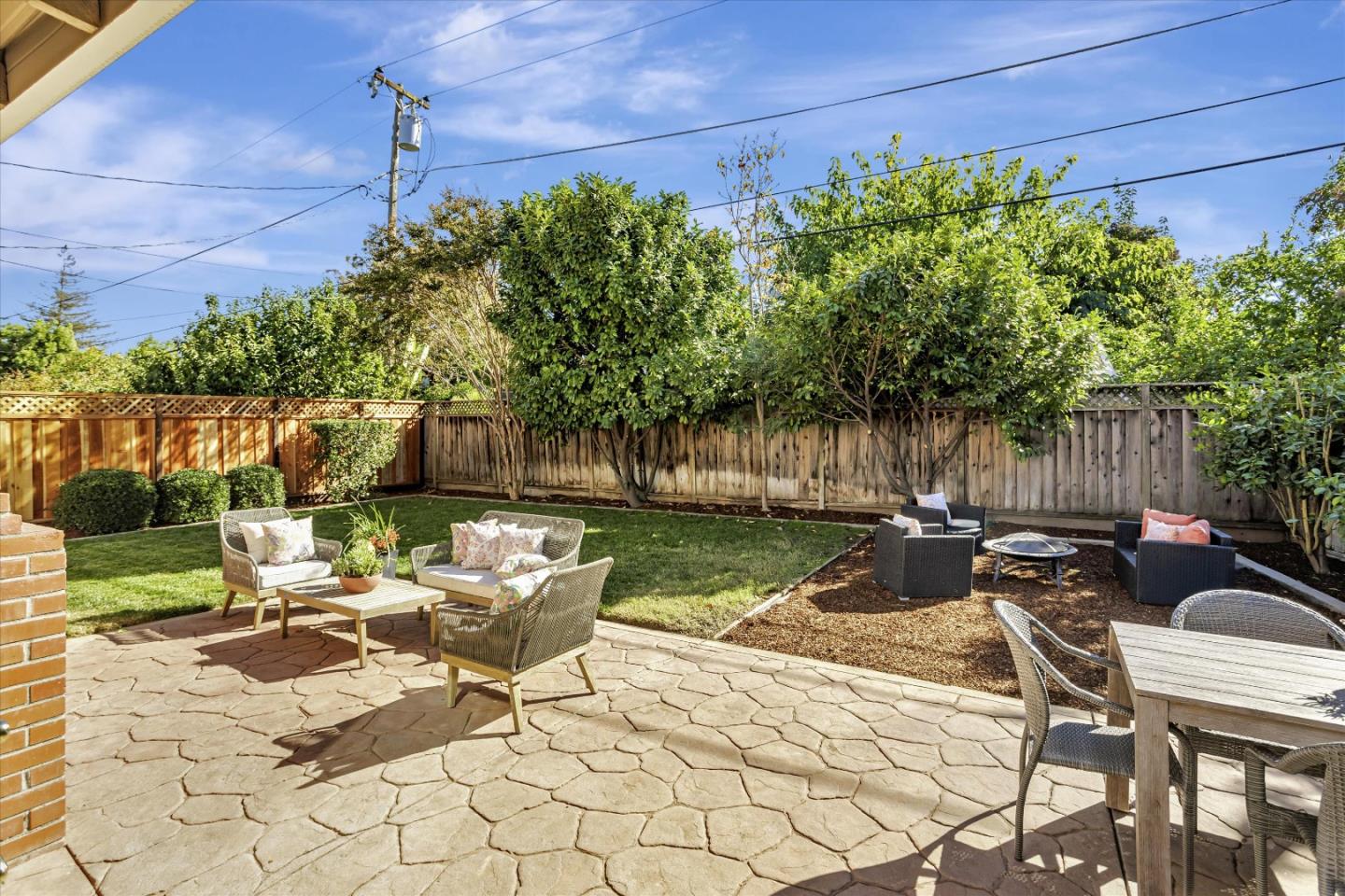 1716 Grizilo Drive San Jose, CA 95124 - Photo 34 of 49 a backyard of a house with outdoor seating