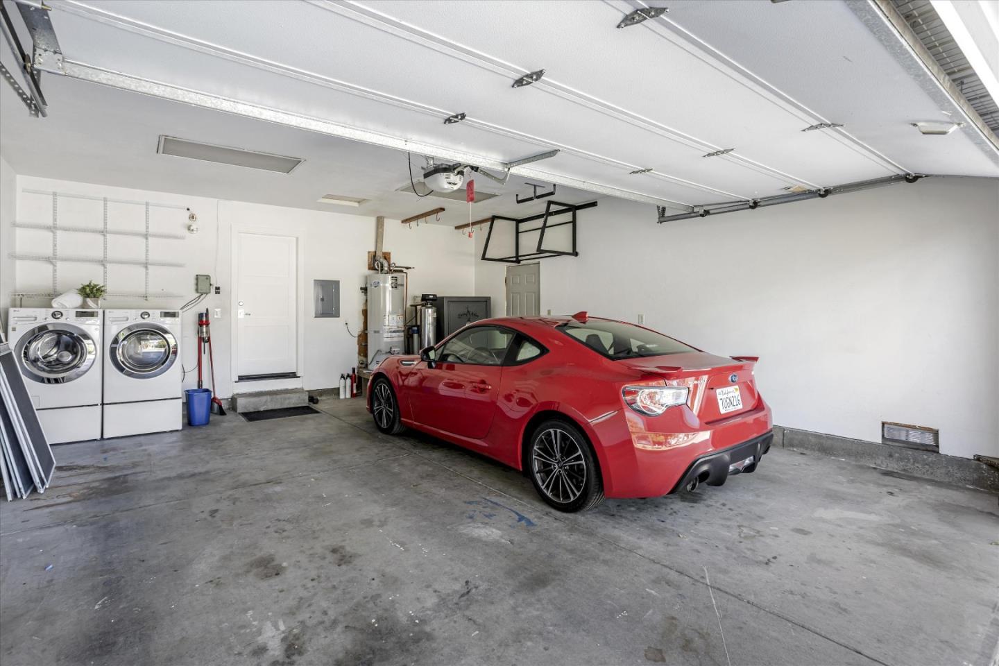 1716 Grizilo Drive San Jose, CA 95124 - Photo 40 of 49 a car is parked in a garage