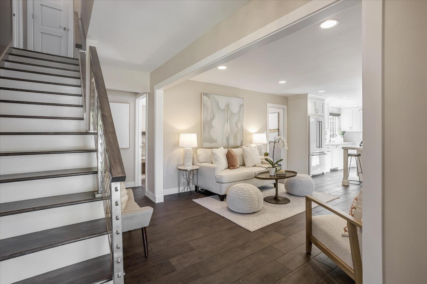 1716 Grizilo Drive San Jose, CA 95124 - Photo 5 of 49 a living room with furniture white walls and wooden floor