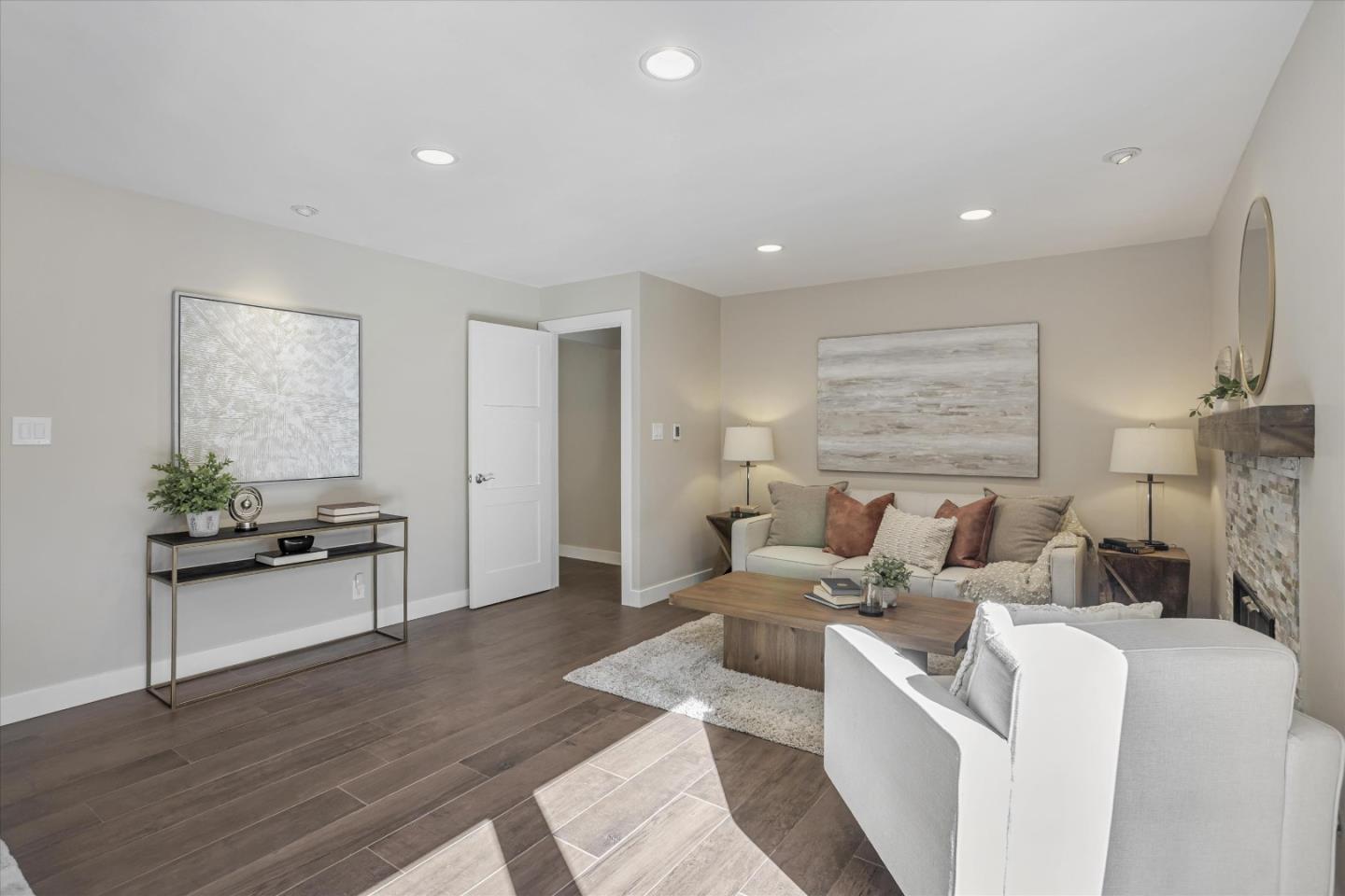 1716 Grizilo Drive San Jose, CA 95124 - Photo 10 of 49 a living room with furniture wooden floor and a fireplace