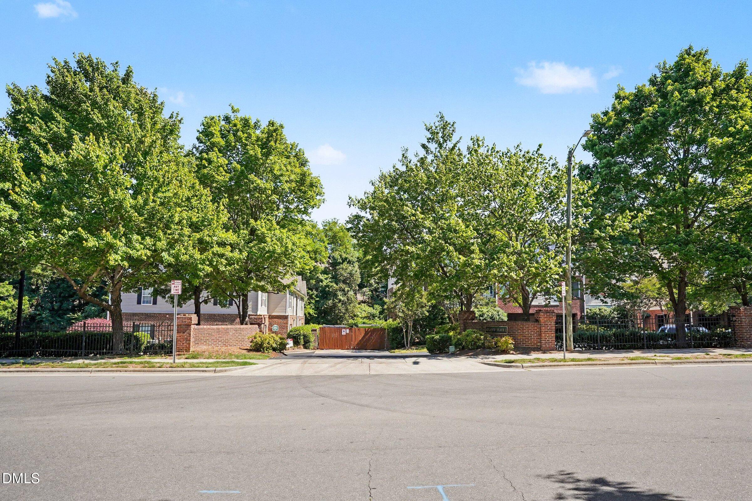 2651 Mellowfield Drive, Unit 203 Raleigh, NC 27604 - Photo 29 of 32 a group of cars parked on the side of street
