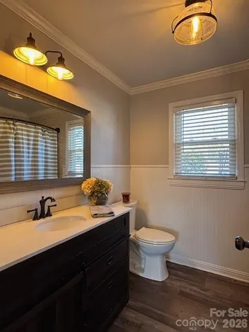 a bathroom with a sink and a toilet