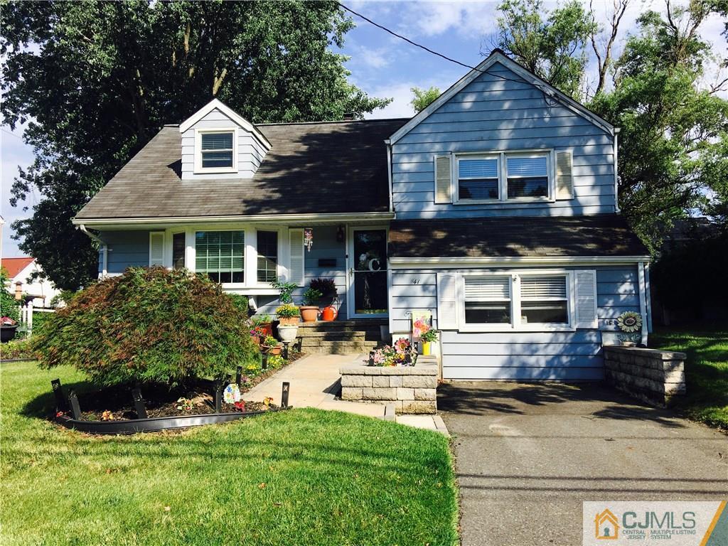 41 Miry Brook Road Hamilton, NJ 08690 - Photo 1 of 11 a front view of a house with a yard