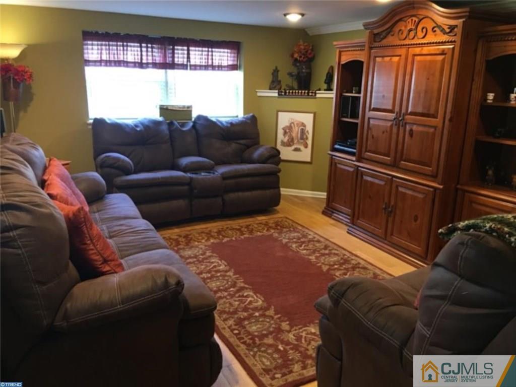 41 Miry Brook Road Hamilton, NJ 08690 - Photo 10 of 11 a living room with furniture and a window