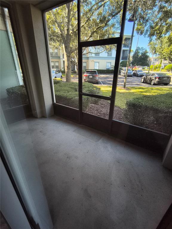 11446 Jasper Kay Terrace, Unit 1009 Windermere, FL 34786 - Photo 7 of 15 a view of a room with a large window