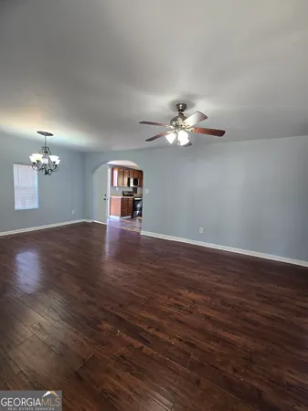 a view of a livingroom with a fan