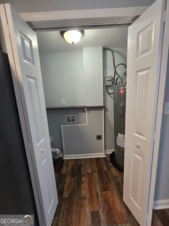 a view of storage and utility room with empty racks