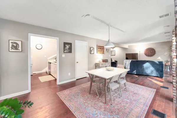 a workspace with furniture and window