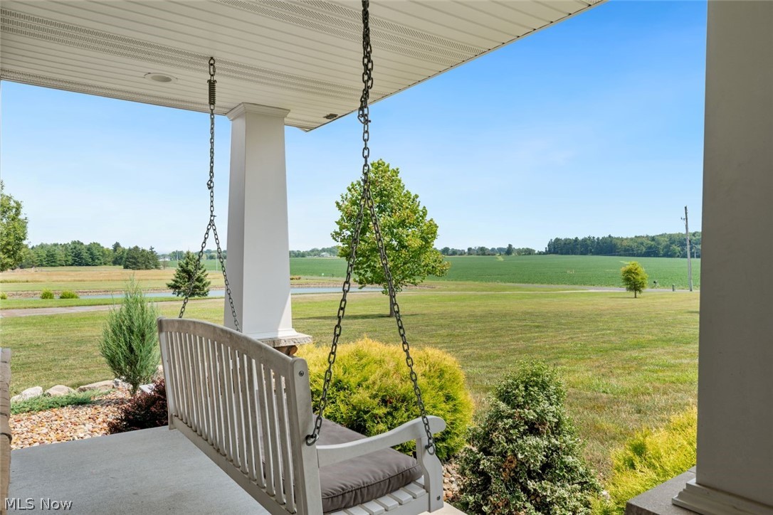 6517 Stone Road Medina, OH 44256 - Photo 6 of 47 View of yard from front covered porch featuring a rural view