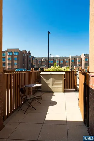 a view of a terrace with chairs