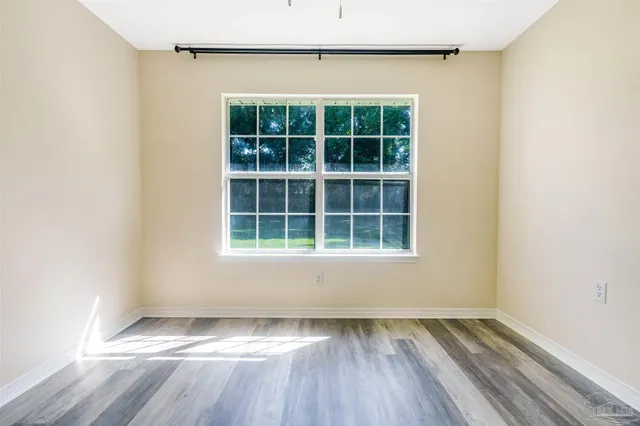a view of small space with wooden floor