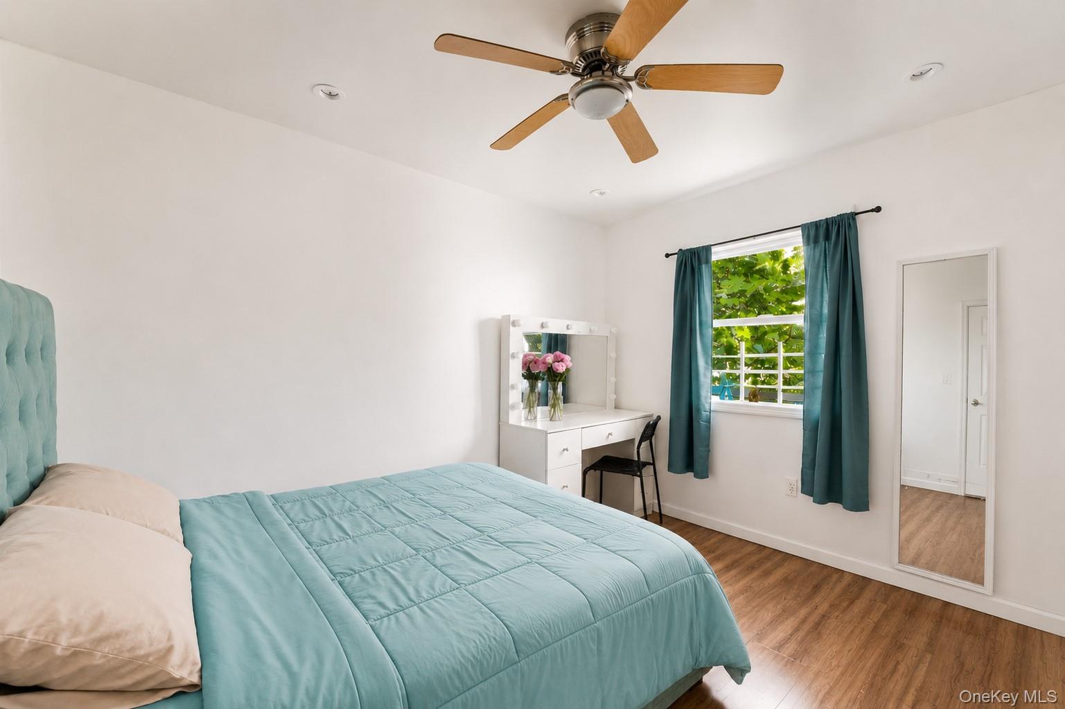 931 Diven Street Peekskill, NY 10566 - Photo 8 of 29 First floor unit bedroom one featuring wood-finish flooring