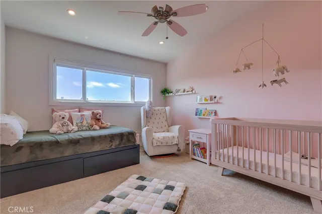 a view of a swimming pool with a lounge chair