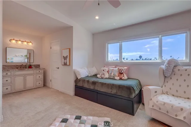 a view of a swimming pool with chairs