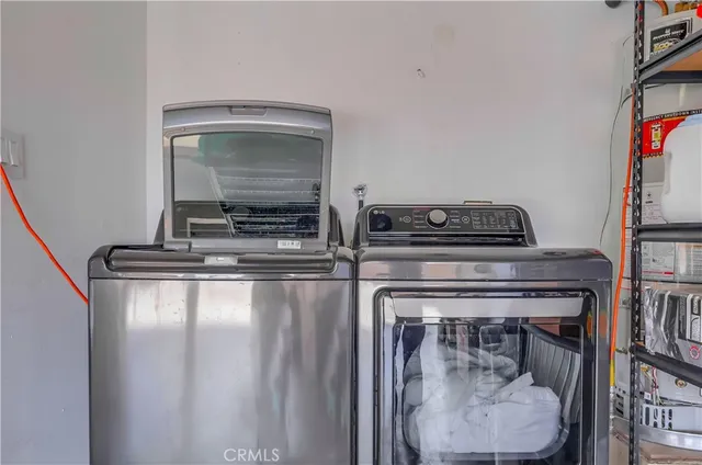 an aerial view of a house with a swimming pool