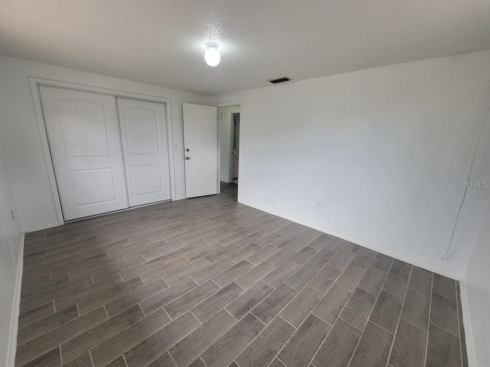 7730 Wicklow Street New Port Richey, FL 34653 - Photo 11 of 19 a view of an empty room