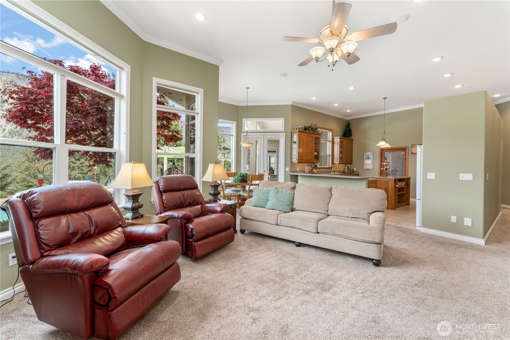 1845 Summit Boulevard Manson, WA 98831 - Photo 12 of 40 a living room with furniture ceiling fan and a rug