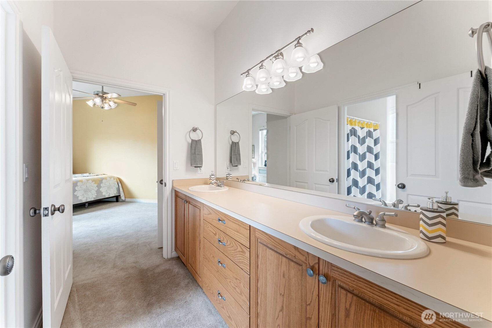 1845 Summit Boulevard Manson, WA 98831 - Photo 29 of 40 a bathroom with a sink double vanity granite and a mirror