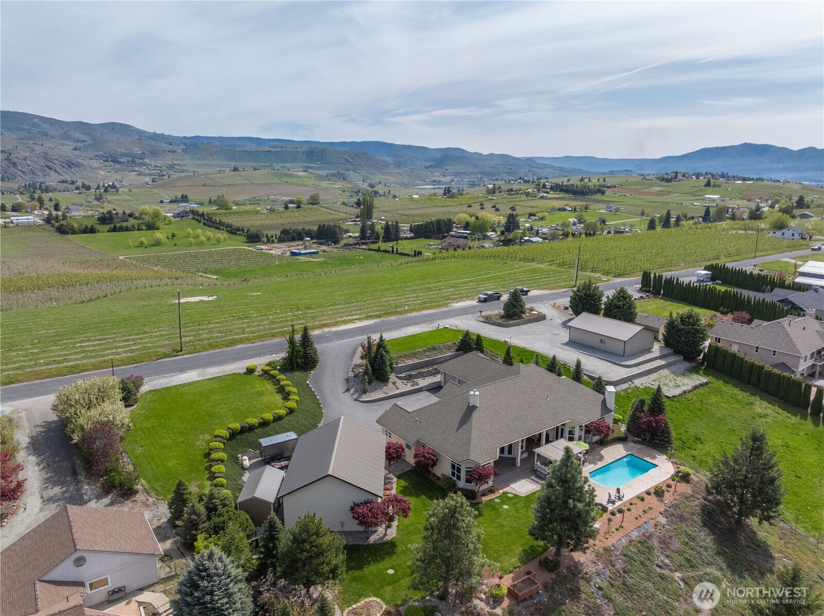 1845 Summit Boulevard Manson, WA 98831 - Photo 34 of 40 an aerial view of a city with lake view