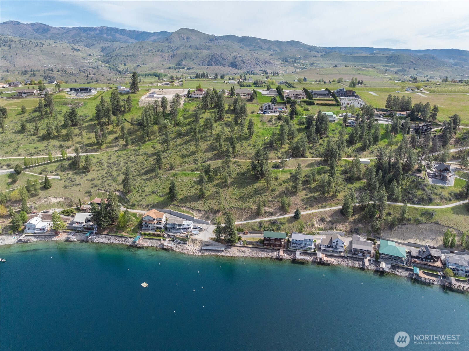 1845 Summit Boulevard Manson, WA 98831 - Photo 40 of 40 an aerial view of residential house with outdoor space