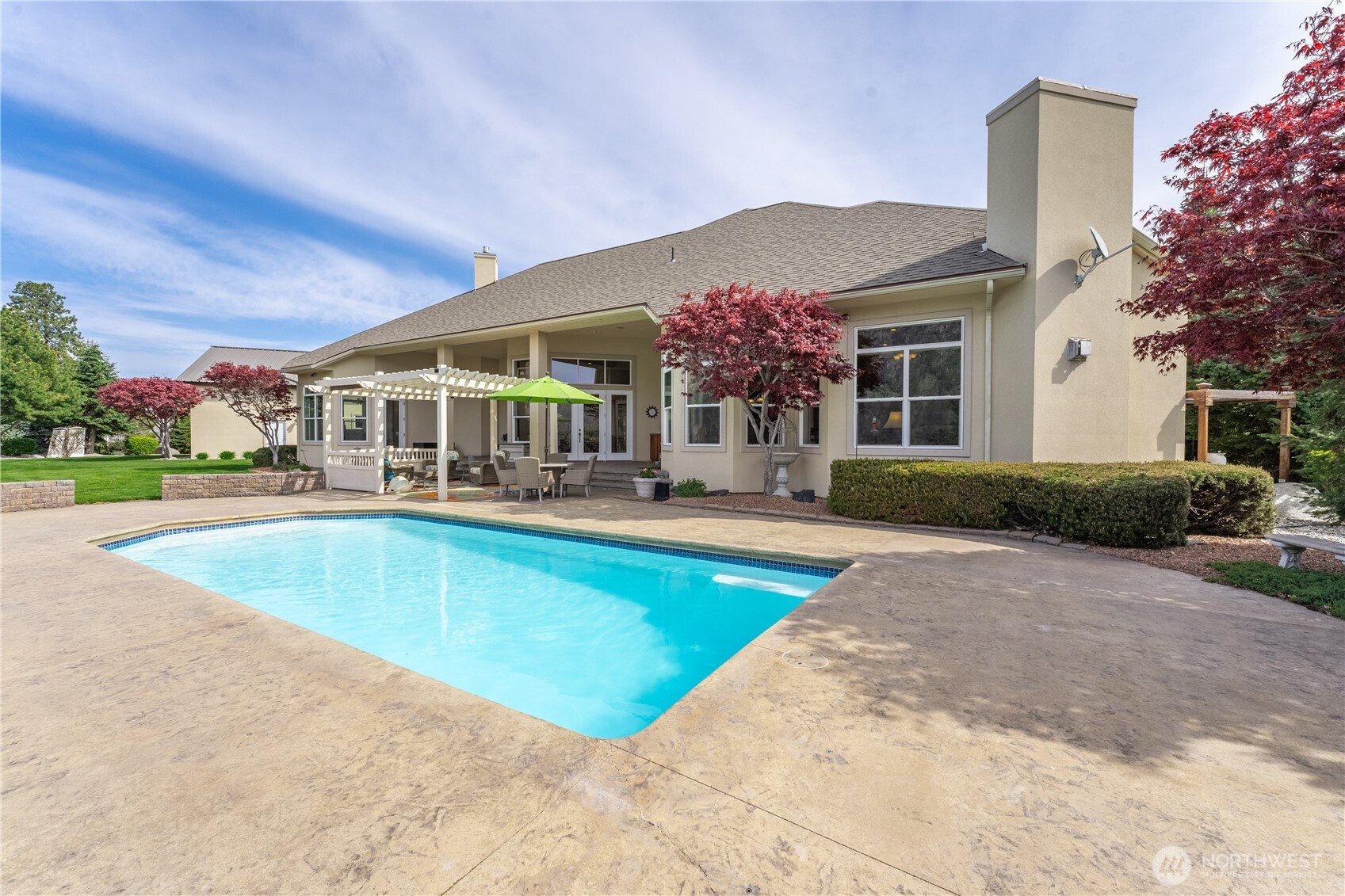 1845 Summit Boulevard Manson, WA 98831 - Photo 5 of 40 a view of house with swimming pool and view of a house
