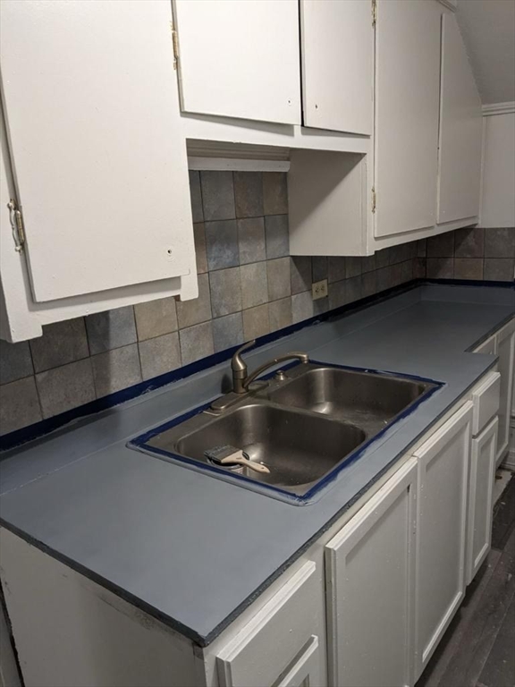 a close view of sink and microwave