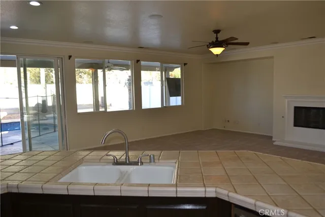 a kitchen with a stove and a refrigerator
