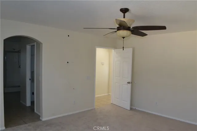 a bathroom with a bathtub sink and mirror
