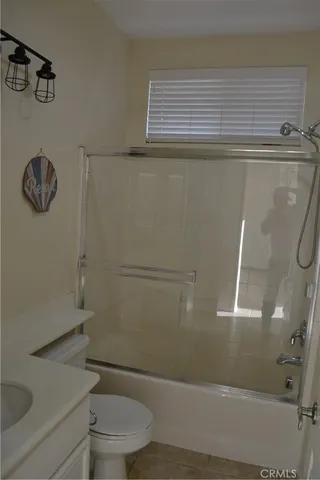 a view of a livingroom with a large window