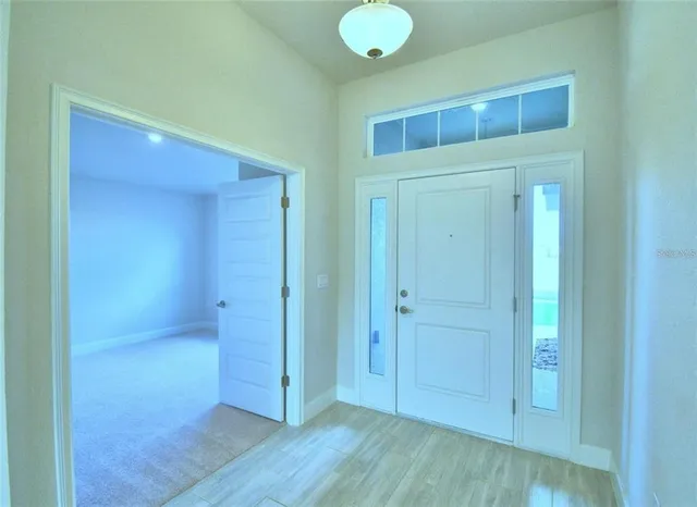 a house with yard in front of it