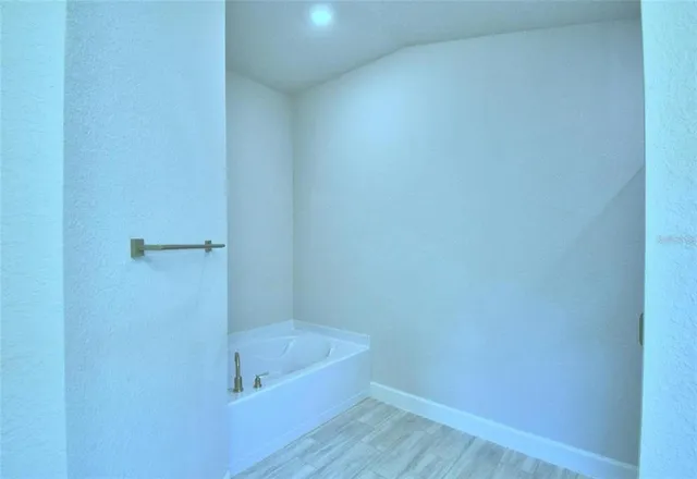 a bathroom with a bathtub