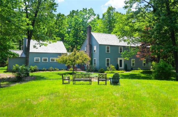 19 Oak Ridge Road Littleton, MA 01460 - Photo 1 of 30 a view of an house with backyard and a patio
