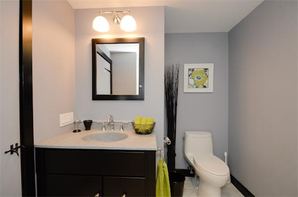 19 Oak Ridge Road Littleton, MA 01460 - Photo 17 of 30 a bathroom with a toilet sink and mirror