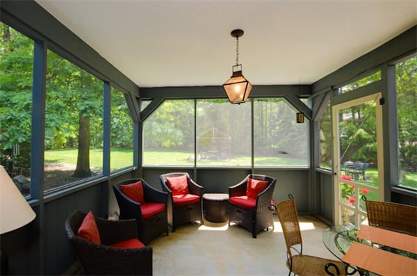19 Oak Ridge Road Littleton, MA 01460 - Photo 18 of 30 a living room with furniture and floor to ceiling windows