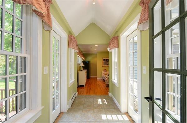 19 Oak Ridge Road Littleton, MA 01460 - Photo 20 of 30 a view of hallway with a large window and chandelier