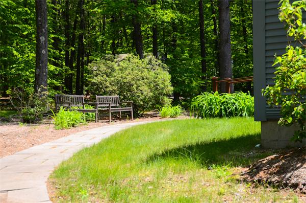 19 Oak Ridge Road Littleton, MA 01460 - Photo 27 of 30 a view of backyard with seating area and green space