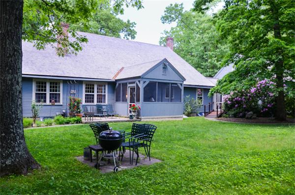 19 Oak Ridge Road Littleton, MA 01460 - Photo 29 of 30 a view of a house with a yard porch and sitting area