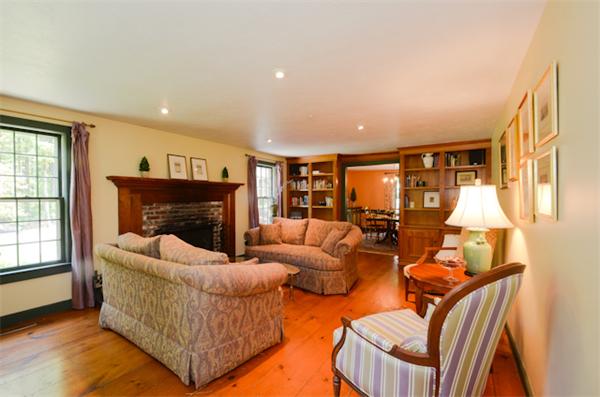 19 Oak Ridge Road Littleton, MA 01460 - Photo 5 of 30 a living room with furniture and a fireplace