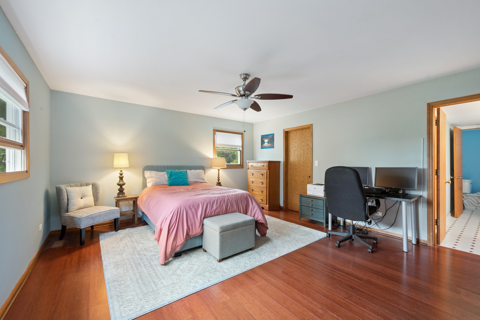 908 Pershing Drive Wauconda, IL 60084 - Photo 15 of 38 a bedroom with a bed and wooden floor