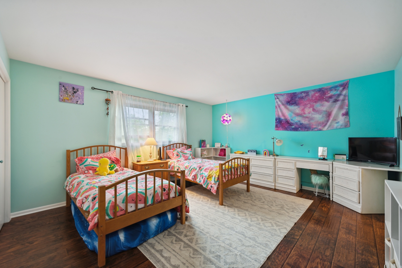 908 Pershing Drive Wauconda, IL 60084 - Photo 16 of 38 a living room with fireplace furniture and a flat screen tv