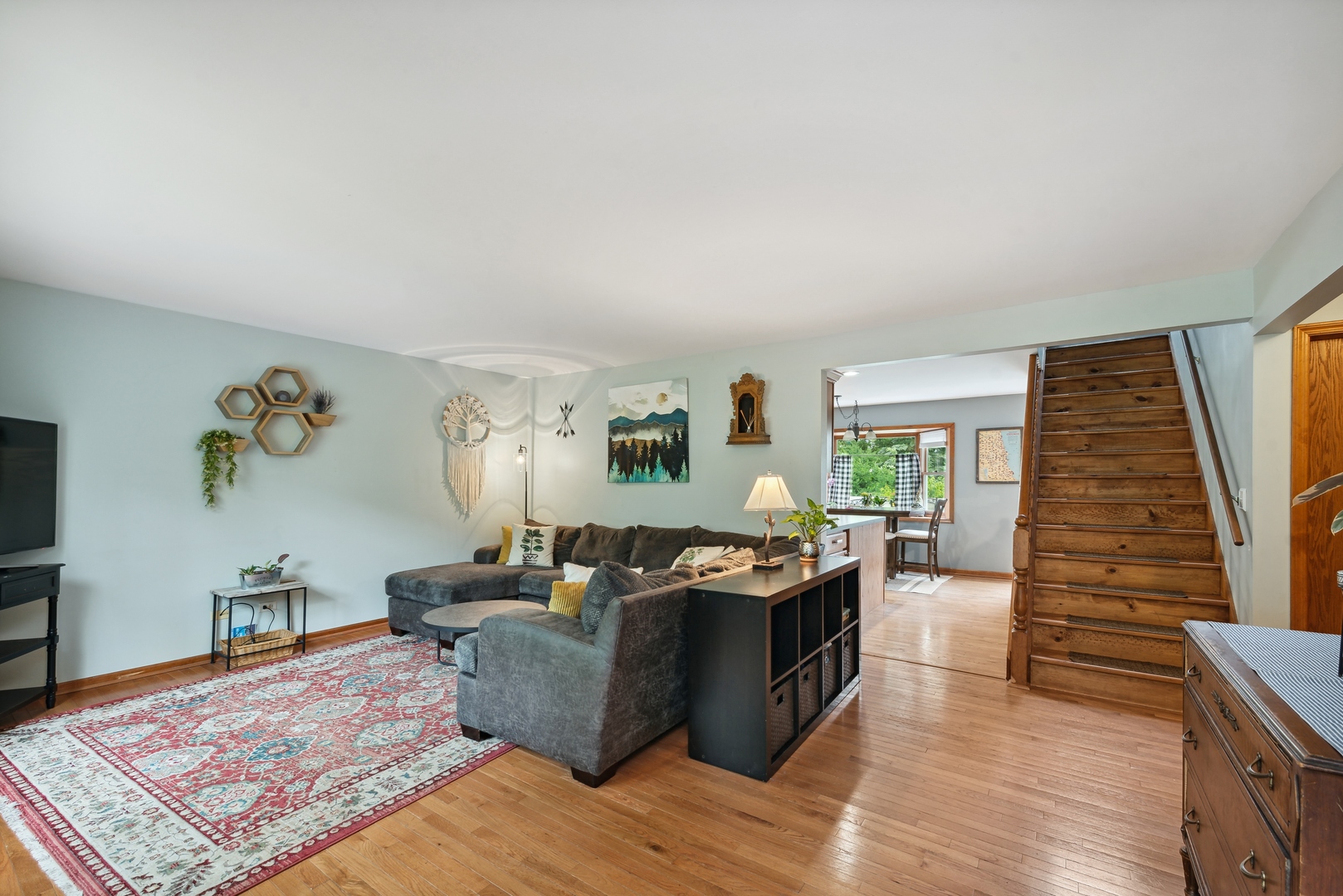 908 Pershing Drive Wauconda, IL 60084 - Photo 2 of 38 a living room with furniture and wooden floor