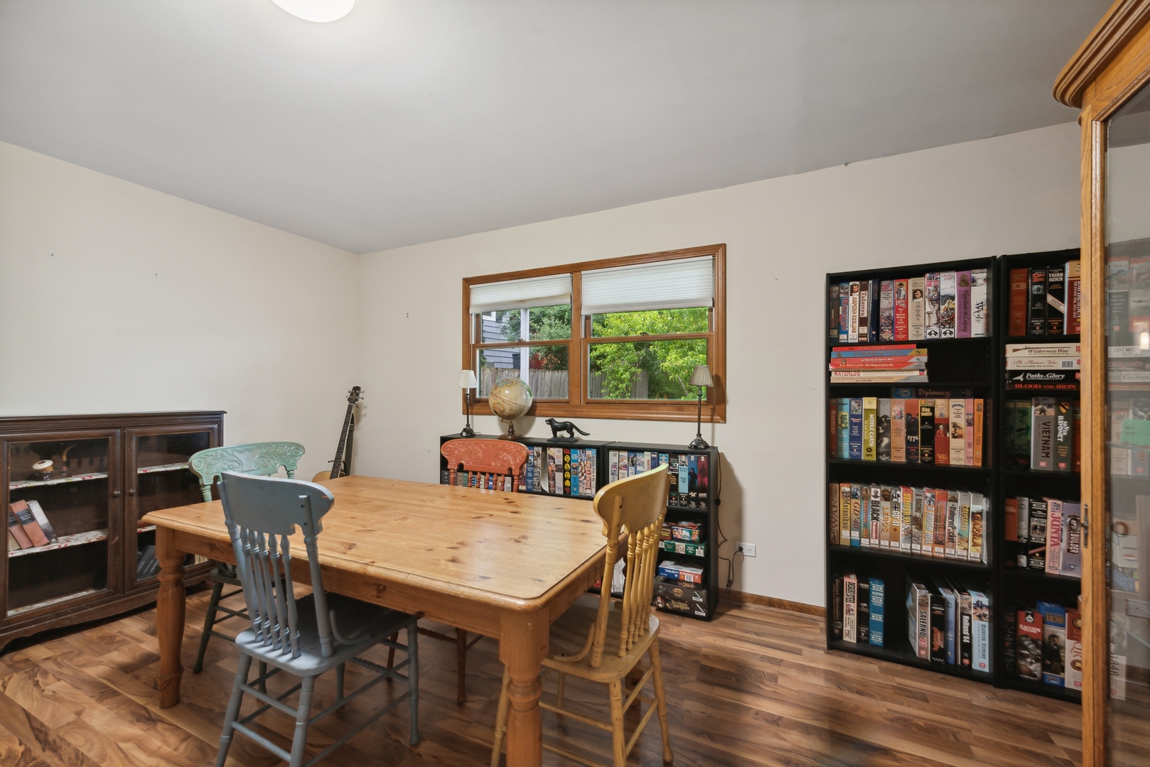 908 Pershing Drive Wauconda, IL 60084 - Photo 22 of 38 a view of a workspace with furniture and a bookshelf