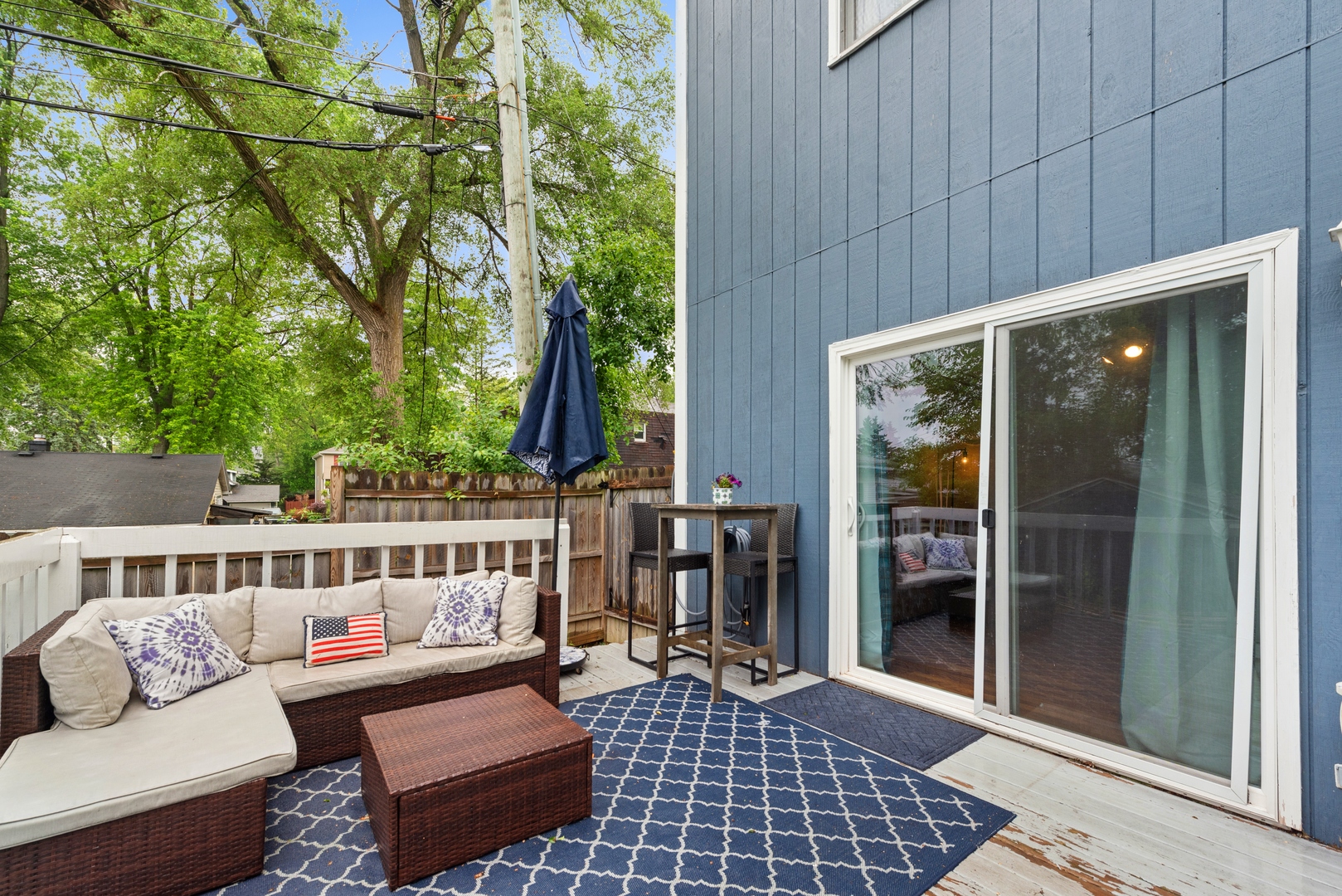 908 Pershing Drive Wauconda, IL 60084 - Photo 24 of 38 a view of a patio with couches and potted plants
