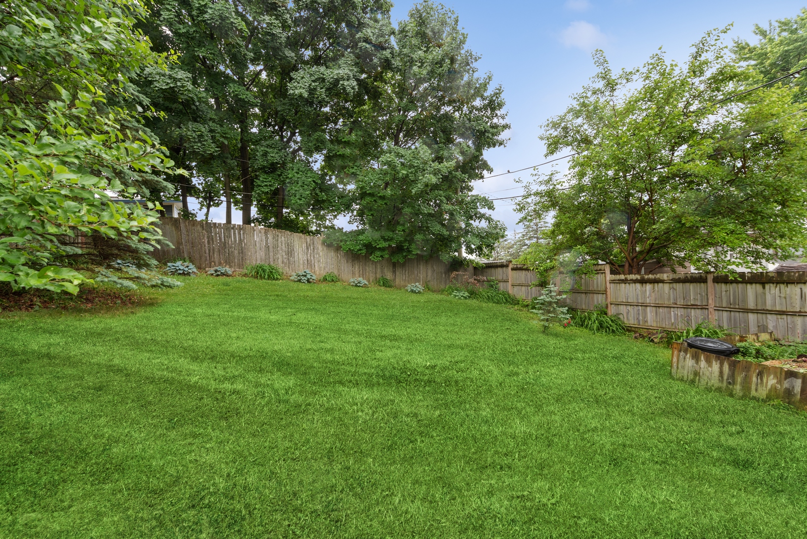 908 Pershing Drive Wauconda, IL 60084 - Photo 27 of 38 a view of a backyard with a small cabin