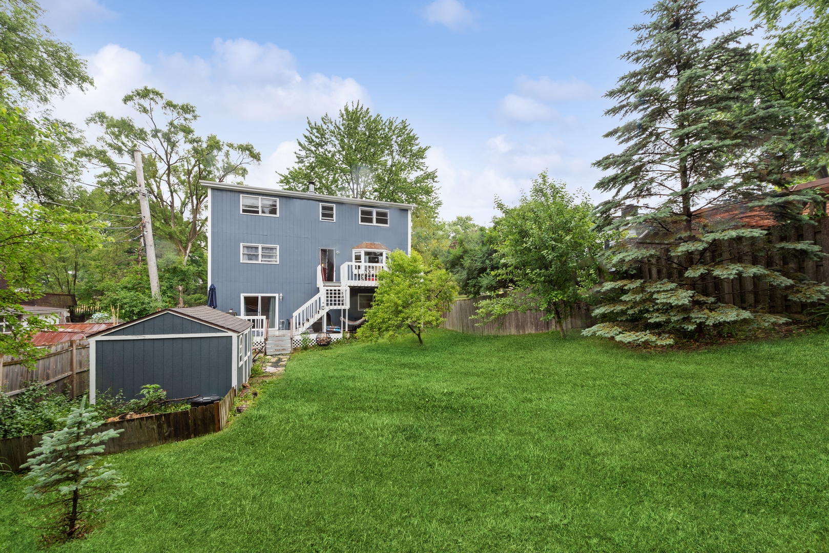 908 Pershing Drive Wauconda, IL 60084 - Photo 28 of 38 a front view of a house with garden