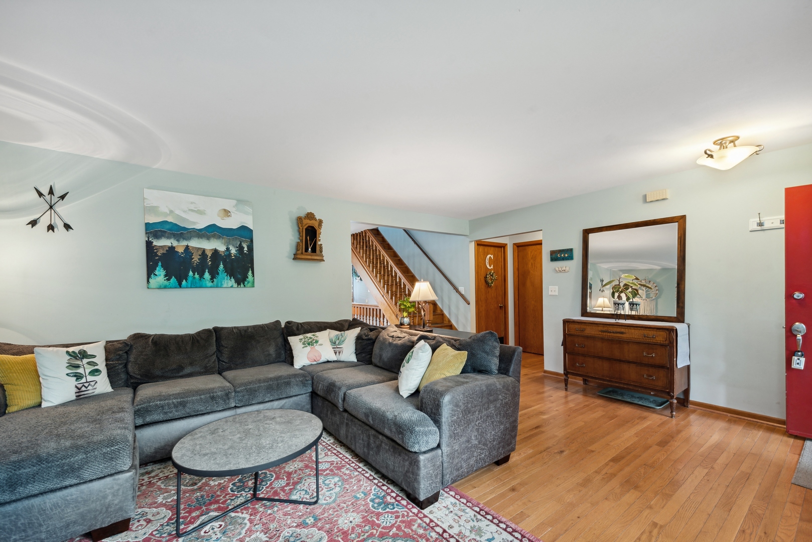 908 Pershing Drive Wauconda, IL 60084 - Photo 3 of 38 a living room with furniture and a wooden floor