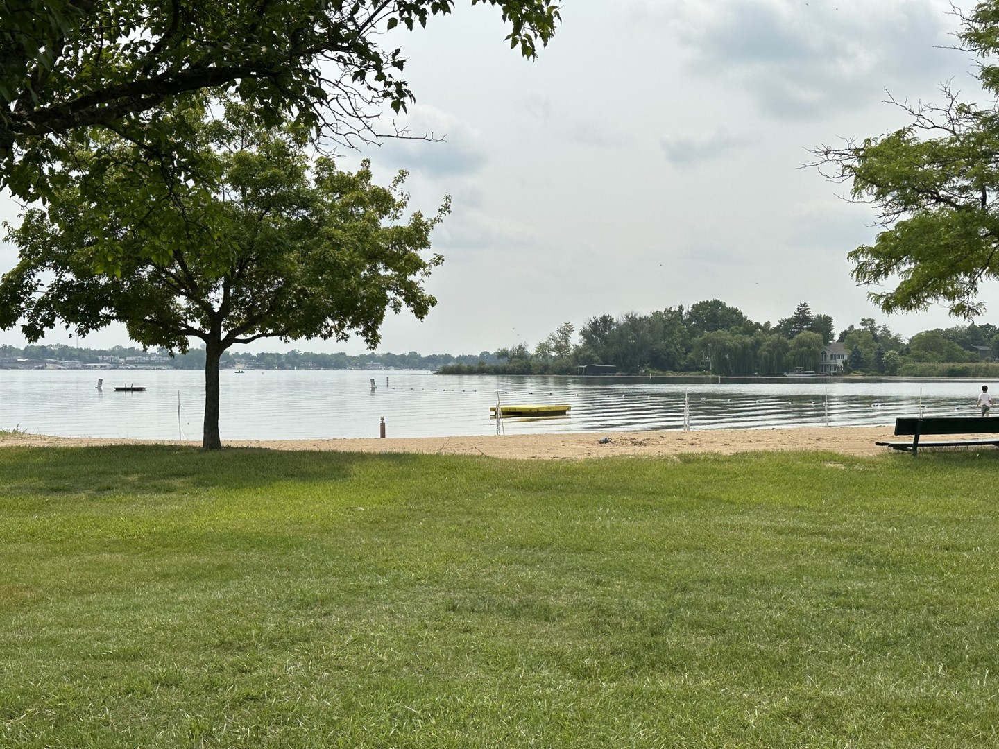 908 Pershing Drive Wauconda, IL 60084 - Photo 31 of 38 a view of a lake with houses in the background